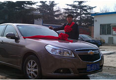 超前涂料獎勵員工轎車，真石漆生產(chǎn)廠家！